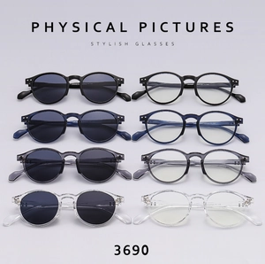 Flat lay of stylish round frame sunglasses set showing eight color and lens variations