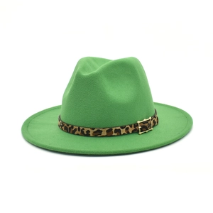 Close-up of wool fedora hat in emerald green with leopard print belt and golden buckle