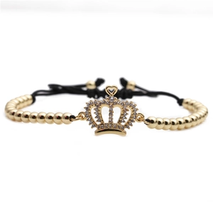Adjustable crown charm bracelet with gold beads, micro-paved cubic zirconia, and black cord