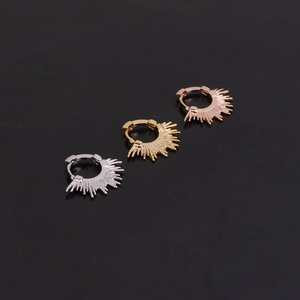 Sunburst geometric cartilage earrings with cubic zirconia in silver, gold, and rose gold