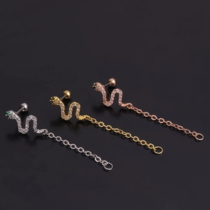 Three-piece stainless steel snake stud earrings with chain tassels and green gemstone eyes