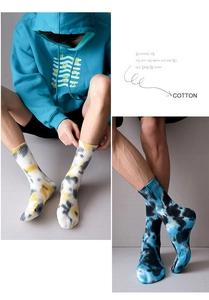 Detailed view of tie-dye cotton crew socks with ribbed cuffs and trendy street style patterns