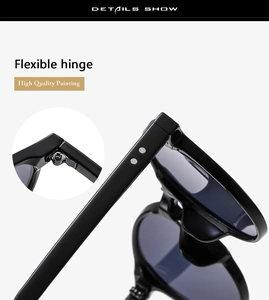 Detail of flexible metal hinges and silver rivets on glossy black round sunglasses