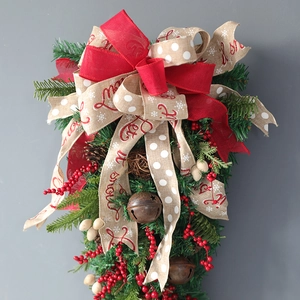 60cm teardrop Christmas swag with red ribbons, pine needles, berries and vintage bells