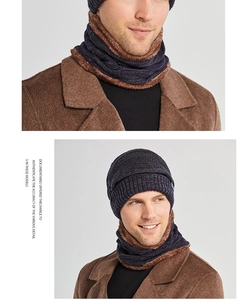 Detail of navy knit beanie and neck warmer with thick brown faux fleece lining