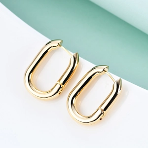 Minimalist 18K gold-plated U-shaped oval hoop earrings with high-gloss metallic finish