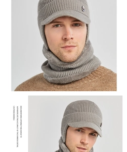 Close-up of gray winter knit hat and neck warmer set with thick fleece lining texture
