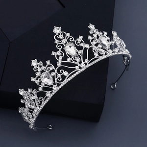 Elegant silver bridal crown with teardrop rhinestones and hollow alloy craftsmanship