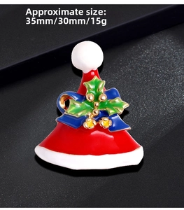 Macro detail of Christmas hat brooch with enamel glaze and blue bow, size 35mm x 30mm