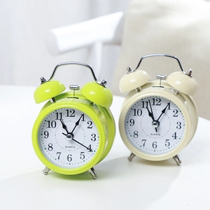 Modern 3 inch twin bell quartz metal alarm clock in green and cream for bedroom