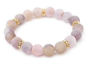Close-up of lavender natural stone bead bracelet with gold diamond-encrusted spacers