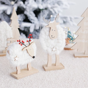 Christmas reindeer and alpaca wooden ornaments set with cozy holiday background lighting