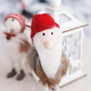 Christmas snowman and reindeer wool felt dolls with warm knitted textures for holiday decor