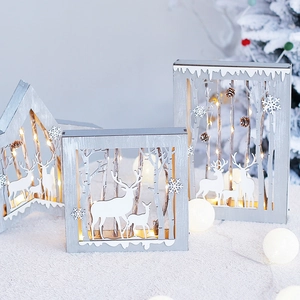 Wooden Christmas star with LED lights and forest carving on white fur background