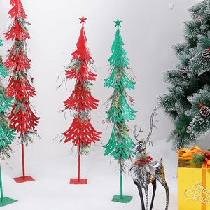 Red and green glitter hollow Christmas trees with reindeer statue for holiday display