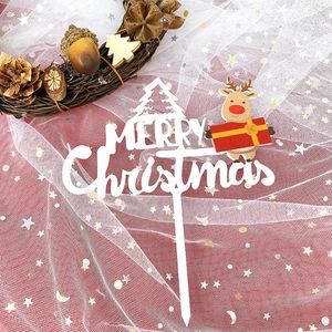 White acrylic Merry Christmas cake topper with cute cartoon reindeer and cutout design