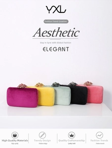 Row of velvet clutch bags in five colors with crystal flower clasp for evening parties