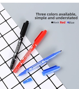 Dual-tip oil-based markers in black red and blue colors showing fine and extra fine tips