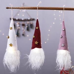 Three glowing Christmas gnomes with LED lights, glitter stars and long white faux fur beards