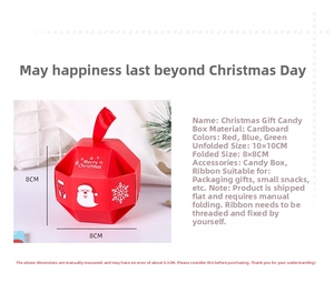 Detail of Christmas candy gift box featuring red ribbon and festive Santa Claus patterns