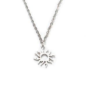 Polished stainless steel necklace featuring a sunburst pendant with a hollow center