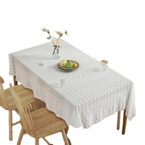 Nordic vintage white cotton lace tablecloth with floral hollow patterns on wooden table
