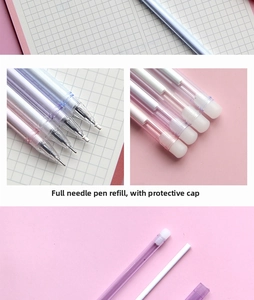 Macro view of needle point gel pen refills with protective caps on pink background