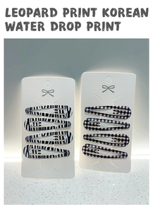 Detail of 8pcs water drop hair clips featuring leopard print and checkered patterns