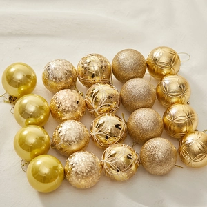 Champagne gold and bronze 6cm Christmas balls set with diverse textures on white cloth