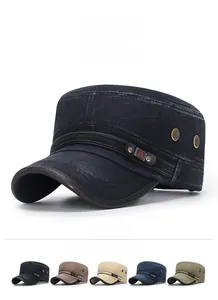Detail of vintage washed cotton flat top military cap with side metal air vents and leather trim