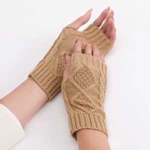 Macro detail of camel knit fingerless gloves with diamond cable stitch and ribbed cuffs