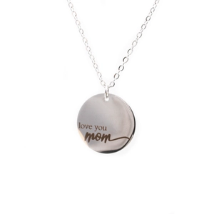Polished silver titanium steel necklace featuring a round pendant engraved with Love You MOM