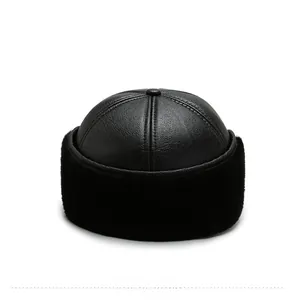 Rear view of men's winter leather hat featuring thick black faux fur ear protection