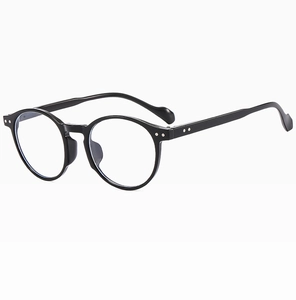 Detailed view of black round frame sunglasses with silver rivets at a 45-degree angle