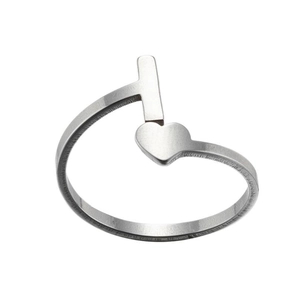 Detailed view of silver T-shaped stainless steel ring with minimalist heart charm