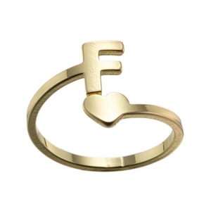 Detail of adjustable gold ring featuring capital letter F and a small heart