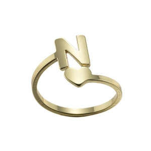 Macro shot of gold stainless steel open ring with letter N and heart shape detail