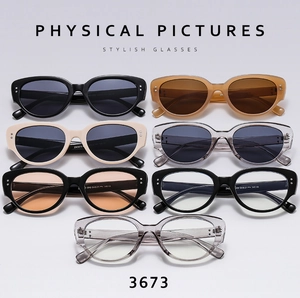 Collection of stylish cat-eye sunglasses in black, amber, and grey frames for men and women