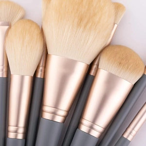 Professional 10pcs makeup brush set with rose gold ferrules and soft beige bristles