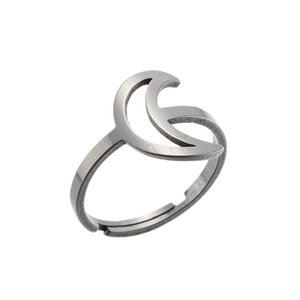 Macro view of silver hollow moon ring with textured brushed stainless steel finish