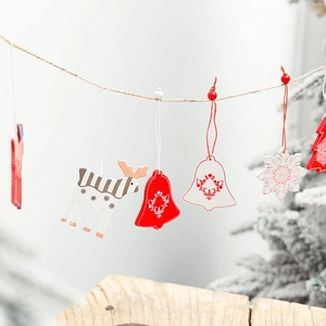 Rustic wood Christmas tree ornaments with red and white reindeer and snowflake designs