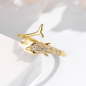 Elegant 18k gold dolphin open ring with sparkling zircon stones and a single round diamond