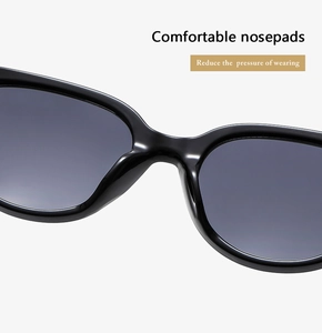 Detail of comfortable wide nosepads on cat-eye sunglasses for reduced wearing pressure