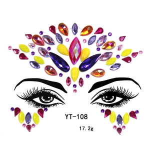 Macro view of colorful acrylic gemstone face stickers in various shapes for masquerade