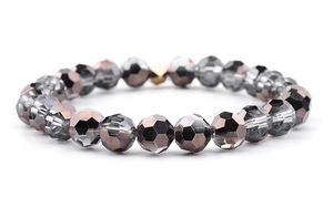 Detailed view of faceted smoke gray crystal beads with iridescent finish on elastic bracelet