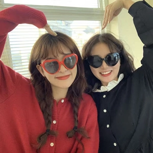 Romantic heart-shaped frame sunglasses in red and black colors for party and fashion use