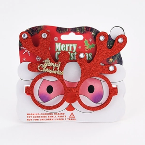 Front view of red glitter reindeer antler glasses on Merry Christmas packaging card