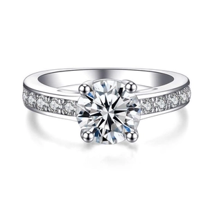 Elegant silver engagement ring with round zircon center stone and side accents