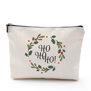 Christmas waterproof linen makeup bag with festive wreath and HO HO HO! print design