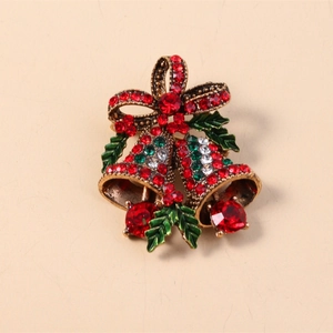 Vintage Christmas bell brooch with red and green rhinestones in antique gold alloy